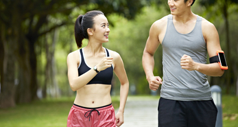 People running outdoors to improve metabolism