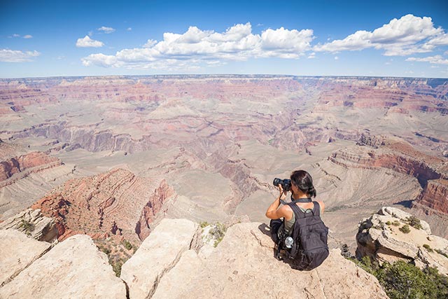 Taking time to enjoy the expansive view of the Grand Canyon after a hike is good for mental health.